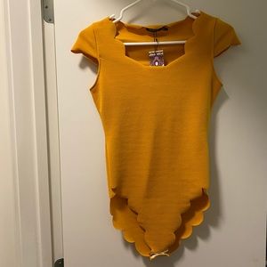 Yellow/gold bodysuit
